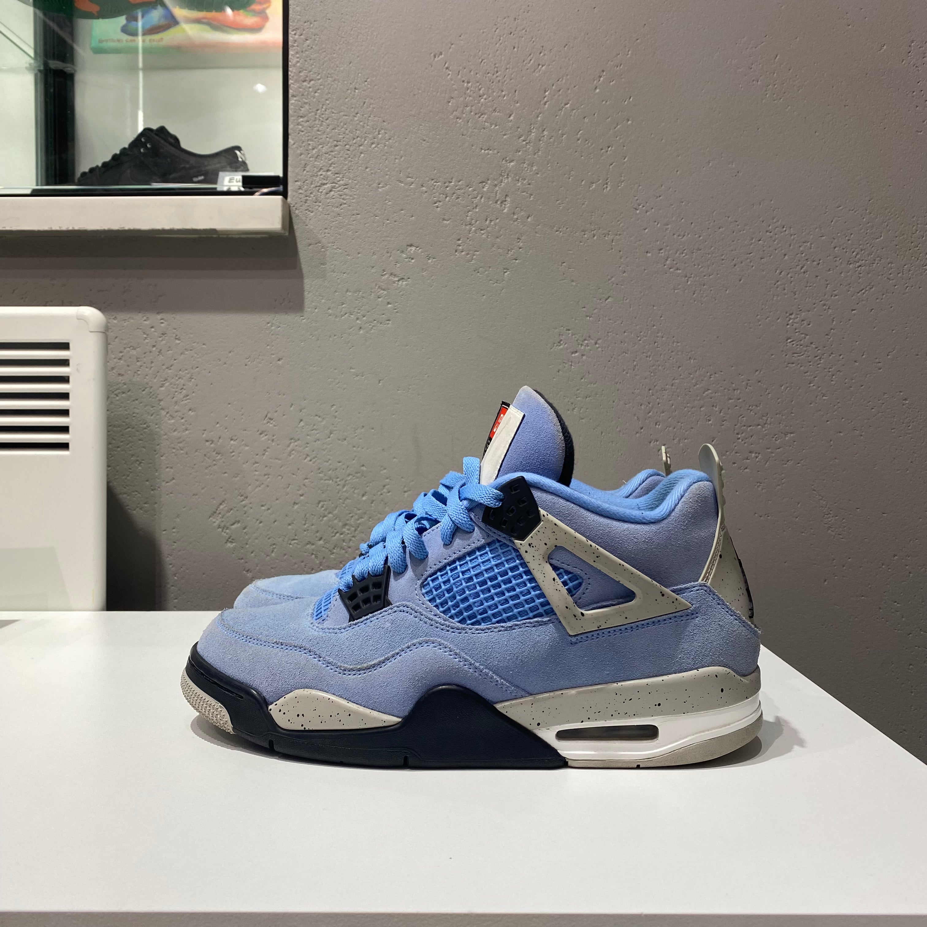 kith jordan 4 university blue
